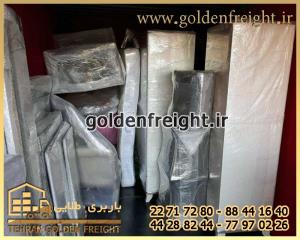 چیدمان لوازم بسته بندی شده در کامیون چیدمان لوازم بسته بندی شده در کامیون